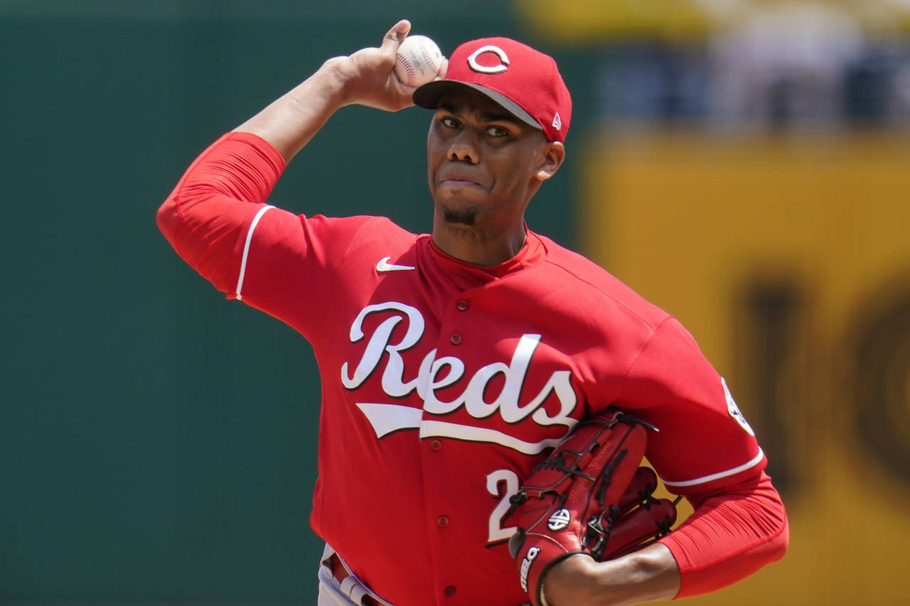 Cincinnati Reds starting pitcher Hunter Greene delivers during the first inning of a baseball game ...