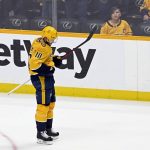 
              Nashville Predators center Colton Sissons (10) skates off the ice after the team's loss to the Colorado Avalanche in Game 3 of an NHL hockey Stanley Cup first-round playoff series Saturday, May 7, 2022, in Nashville, Tenn. (AP Photo/Mark Zaleski)
            