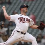 
              Minnesota Twins pitcher Dylan Bundy delivers a pitch during the first inning of a baseball game against the Detroit Tigers, Wednesday, May 25, 2022, in Minneapolis. (AP Photo/Stacy Bengs)
            