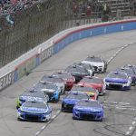 
              Drivers take the green flag to start Stage 1 of a NASCAR All-Star auto race at Texas Motor Speedway in Fort Worth, Texas, Sunday, May 22, 2022. (AP Photo/Larry Papke)
            