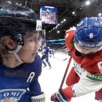 
              Mikael Granlund, left, of Finland vies with Michal Kempny of Czech Republic during the 2022 IIHF Ice Hockey World Championships preliminary round group B match between Finland and Czech Republic in Tampere, Finland, Tuesday, May 24, 2022. (Vesa Moilanen/Lehtikuva via AP)
            