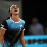
              Ons Jabeur reacts during a women's final against Jessica Pegula, at the Mutua Madrid Open tennis tournament in Madrid, Spain, Saturday, May 7, 2022. (AP Photo/Manu Fernandez)
            