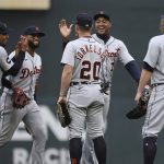 
              Members of the Detroit Tigers celebrate their 4-2 win over the Minnesota Twins following the 10th inning of a baseball game Wednesday, May 25, 2022, in Minneapolis. (AP Photo/Stacy Bengs)
            