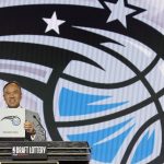 
              NBA Deputy Commissioner Mark Tatum announces that the Orlando Magic have won the first pick in the 2022 NBA draft during the NBA basketball draft lottery Tuesday, May 17, 2022, in Chicago. (AP Photo/Charles Rex Arbogast)
            