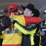 
              Ryan Blaney, right, gets a hug from Joey Logano in Victory Lane after Blaney won the NASCAR All-Star auto race at Texas Motor Speedway in Fort Worth, Texas, Sunday, May 22, 2022. (AP Photo/Larry Papke)
            