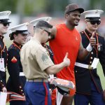 
              Cleveland Browns quarterback Deshaun Watson poses for a photo with members of the military who were in attendance during NFL football practice at the team's training facility Wednesday, May 25, 2022, in Berea, Ohio. (AP Photo/Ron Schwane)
            