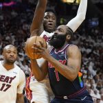 
              Philadelphia 76ers guard James Harden (1) drives to the basket as Miami Heat guard Victor Oladipo (4) defends during the first half of Game 1 of an NBA basketball second-round playoff series, Monday, May 2, 2022, in Miami. (AP Photo/Marta Lavandier)
            