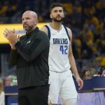 
              Dallas Mavericks coach Jason Kidd, left, claps next to forward Maxi Kleber (42) during the first half in Game 5 of the team's NBA basketball playoffs Western Conference finals against the Golden State Warriors in San Francisco, Thursday, May 26, 2022. (AP Photo/Jeff Chiu)
            