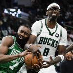 
              Milwaukee Bucks' Bobby Portis ties up Boston Celtics' Jaylen Brown during the second half of Game 3 of an NBA basketball Eastern Conference semifinals playoff series Saturday, May 7, 2022, in Milwaukee. The Bucks won 103-101 to take a 2-1 lead in the series. (AP Photo/Morry Gash)
            