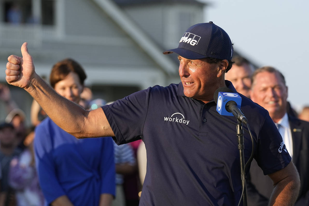 FILE - Phil Mickelson speaks after winning the PGA Championship golf tournament on the Ocean Course...