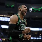 
              Boston Celtics' Al Horford reacts during the second half of Game 4 of an NBA basketball Eastern Conference semifinals playoff series Monday, May 9, 2022, in Milwaukee. The Celtics won 116-108 to tie the series 2-2. (AP Photo/Morry Gash)
            