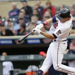 
              Minnesota Twins' Max Kepler hits a grand slam against the Detroit Tigers in the first inning of a baseball game Monday, May 23, 2022, in Minneapolis. (AP Photo/Andy Clayton-King)
            