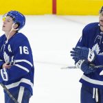 
              Toronto Maple Leafs forward Mitchell Marner (16) and teammate Auston Matthews (34) react after being knocked out of the Stanley Cup playoffs in Game 7 in an NHL hockey first-round playoff series against the Tampa Bay Lightning in Toronto, Saturday, May 14, 2022. (Nathan Denette/The Canadian Press via AP)
            