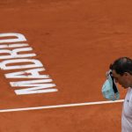 
              Spain's Rafael Nadal adjuts his cap during a training session at the Mutua Madrid Open tennis tournament in Madrid, Spain, Thursday, April 28, 2022. (AP Photo/Manu Fernandez)
            