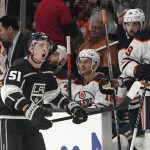 
              Los Angeles Kings defenseman Troy Stecher celebrates in front of the Edmonton Oilers' bench after scoring during the first period in Game 4 of an NHL hockey Stanley Cup first-round playoff series Sunday, May 8, 2022, in Los Angeles. (AP Photo/Mark J. Terrill)
            