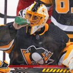 
              Pittsburgh Penguins goaltender Casey DeSmith drinks during the third period of an NHL hockey game against the Columbus Blue Jackets in Pittsburgh, Friday, April 29, 2022. (AP Photo/Gene J. Puskar)
            