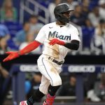 
              Miami Marlins' Jazz Chisholm Jr. watches after hitting an RBI-single to score Erik Gonzalez during the second inning of a baseball game against the Washington Nationals, Monday, May 16, 2022, in Miami. (AP Photo/Lynne Sladky)
            