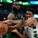 
              Milwaukee Bucks' Giannis Antetokounmpo and Boston Celtics' Jaylen Brown battle during the first half of Game 4 of an NBA basketball Eastern Conference semifinals playoff series Monday, May 9, 2022, in Milwaukee. (AP Photo/Morry Gash)
            