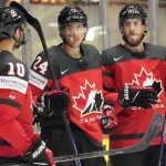
              Dylan Cozens of Canada, center, celebrate after scoring a goal during the group A Hockey World Championship match between Canada and Kazakhstan in Helsinki, Finland, Thursday May 19 2022. (AP Photo/Martin Meissner)
            