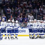
              The Tampa Bay Lightning celebrate after an NHL hockey game against the New York Islanders, Friday, April 29, 2022, in Elmont, N.Y. (AP Photo/Frank Franklin II)
            