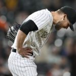 
              Colorado Rockies relief pitcher Daniel Bard reacts after giving up a solo home run to San Francisco Giants' Mike Yastrzemski in the ninth inning of a baseball game Monday, May 16, 2022, in Denver. (AP Photo/David Zalubowski)
            