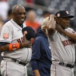 
              Houston Astros manager Dusty Baker Jr., left, looks on next to third base coach Gary Pettis, right, before a baseball game against the Washington Nationals, Saturday, May 14, 2022, in Washington. (AP Photo/Nick Wass)
            