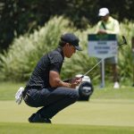 
              Cameron Champ, of the United States, lines up a putt on the sixth hole green during the final round of the Mexico Open at Vidanta in Puerto Vallarta, Mexico, Sunday, May 1, 2022. (AP Photo/Eduardo Verdugo)
            