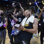 
              Golden State Warriors guard Stephen Curry celebrates after the Warriors defeated the Dallas Mavericks in Game 5 of the NBA basketball playoffs Western Conference finals in San Francisco, Thursday, May 26, 2022. (AP Photo/Jeff Chiu)
            