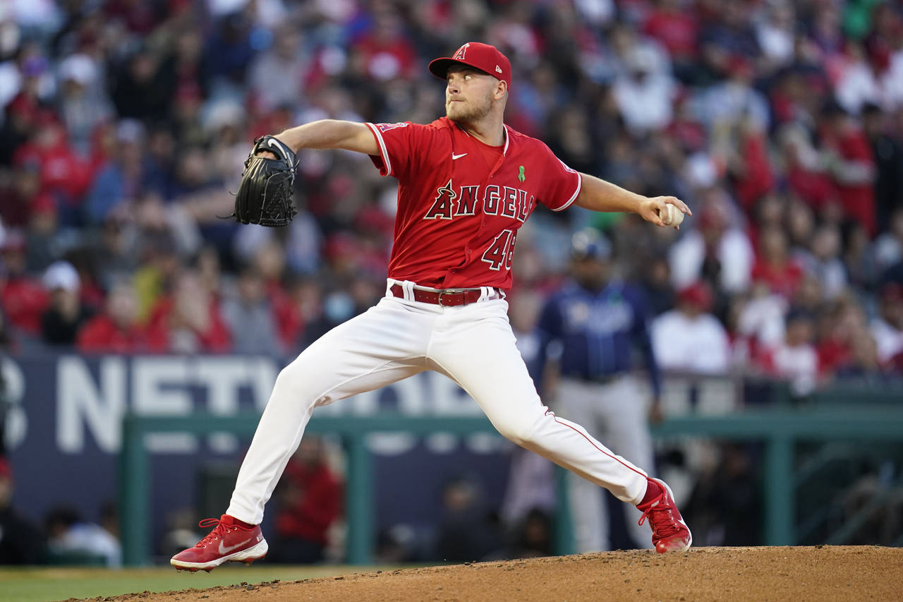 Los Angeles Angels starting pitcher Reid Detmers (48) throws during the second inning of a baseball...