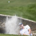 
              David Skinns, of England, hits out of the bunker on the 18th hole during the second round of the AT&T Byron Nelson golf tournament in McKinney, Texas, on Friday, May 13, 2022. (AP Photo/Emil Lippe)
            
