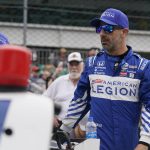 
              Tony Kanaan, of Brazil, waits to drive during qualifications for the Indianapolis 500 auto race at Indianapolis Motor Speedway, Saturday, May 21, 2022, in Indianapolis. (AP Photo/Darron Cummings)
            