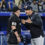 
              New York Yankees manager Aaron Boone argues with home plate umpire Marty Foster during the eighth inning of the team's baseball game against the Toronto Blue Jays on Wednesday, May 4, 2022, in Toronto. (Christopher Katsarov/The Canadian Press via AP)
            