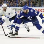 
              Toronto Maple Leafs defenseman TJ Brodie (78) slashes the stick away from Tampa Bay Lightning left wing Nicholas Paul (20) during the second period in Game 4 of an NHL hockey first-round playoff series Sunday, May 8, 2022, in Tampa, Fla. (AP Photo/Chris O'Meara)
            