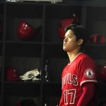 
              Los Angeles Angels Shohei Ohtani, of Japan, looks out from the dugout before batting in the fifth inning of a baseball game against the Texas Rangers in Arlington, Texas, Monday, May 16, 2022. (AP Photo/LM Otero)
            
