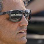 
              Juan Pablo Montoya, of Colombia, watches from the pit area during practice for the IndyCar auto race at Indianapolis Motor Speedway in Indianapolis, Friday, May 20, 2022. (AP Photo/Michael Conroy)
            
