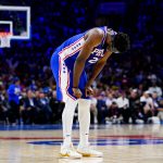 
              Philadelphia 76ers' Joel Embiid bows his head during the second half of Game 6 of an NBA basketball second-round playoff series against the Miami Heat, Thursday, May 12, 2022, in Philadelphia. (AP Photo/Matt Slocum)
            