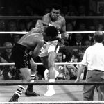 
              FILE - In this 1978 photo taken by Leonard Ignelzi, Muhammad Ali connects with a right cross to the head of challenger Leon Spinks during the third round of a boxing bout in Las Vegas. Ignelzi, whose knack for being in the right place at the right time produced breathtaking images of Hall of Fame sports figures, life along the U.S.-Mexico border, devastating wildfires and numerous other major news events over nearly four decades as a photographer for The Associated Press in San Diego, has died. He was 74. (AP Photo/Lenny Ignelzi, File)
            