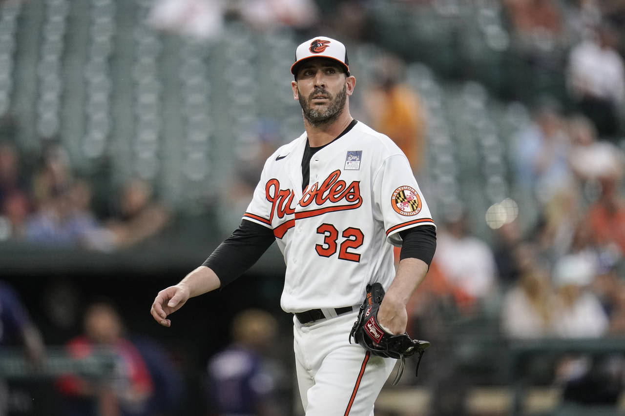FILE - Baltimore Orioles starting pitcher Matt Harvey heads to the dugout after pitching to the Min...