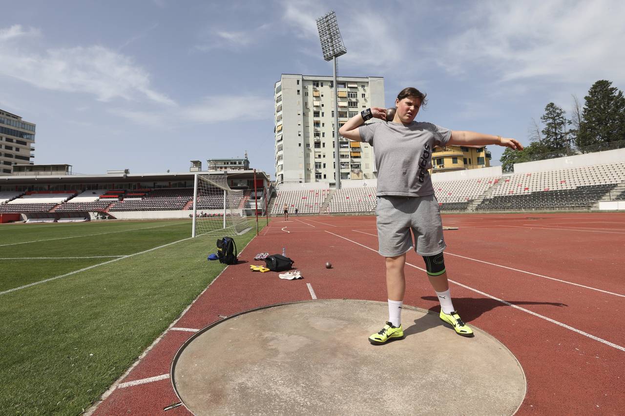 Ukrainian athlete Maria Larina, 17, practices during a training session at Elbasan Arena stadium in...