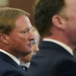 
              Jon Gruden listens in court Wednesday, May 25, 2022, in Las Vegas. A Nevada judge heard a bid Wednesday by the National Football League to dismiss former Las Vegas Raiders coach Jon Gruden's lawsuit accusing the league of a "malicious and orchestrated campaign" including the leaking of offensive emails ahead of his resignation last October. (AP Photo/John Locher)
            