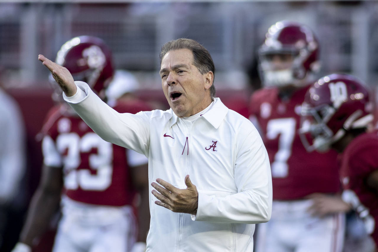FILE - Alabama head coach Nick Saban yells instruction before an NCAA college football game against...