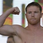 
              Canelo Alvarez poses during a ceremonial boxing weigh-in, Friday, May 6, 2022, in Las Vegas. Alvarez is scheduled to fight Dmitry Bivol Saturday in Las Vegas. (AP Photo/John Locher)
            