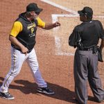 
              Pittsburgh Pirates' Derek Shelton, left, makes his point to umpire Alfonso Marquez after being ejected from a baseball game during the seventh inning against the Cincinnati Reds in Pittsburgh, Sunday, May 15, 2022. (AP Photo/Gene J. Puskar)
            