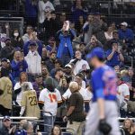 
              Chicago Cubs fans react as starting pitcher Kyle Hendricks exits with two outs in the ninth inning of a baseball game against the San Diego Padres, Monday, May 9, 2022, in San Diego. (AP Photo/Gregory Bull)
            