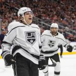 
              Los Angeles Kings' Trevor Moore (12) celebrates a goal against the Edmonton Oilers during the first period of Game 1 of an NHL hockey Stanley Cup first-round playoff series, Monday, May 2, 2022 in Edmonton, Alberta. (Jason Franson/The Canadian Press via AP)
            