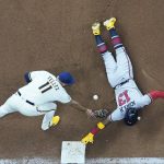 
              Atlanta Braves' Ronald Acuna Jr. slides safely back to first on a pick off attempt as Milwaukee Brewers' Rowdy Tellez takes the throw during the eighth inning of a baseball game Tuesday, May 17, 2022, in Milwaukee. (AP Photo/Morry Gash)
            