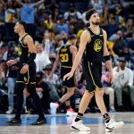 
              Golden State Warriors Klay Thompson (11) reacts to a foul call during the first half of Game 5 of an NBA basketball second-round playoff series against the Memphis Grizzlies, Wednesday, May 11, 2022, in Memphis, Tenn. (Carlos Avila Gonzalez/San Francisco Chronicle via AP)
            
