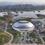 
              In this photo released by Xinhua News Agency, an aerial photo taken on March 28, 2022, shows a view of Chun'an Jieshou Sports Centre Velodrome, a venue of the 19th Asian Games Hangzhou 2022 in Hangzhou, eastern China's Zhejiang Province. Less than three months after Beijing hosted the Winter Olympics and Paralympics, the Olympic Council of Asia said Friday that this year's Asian Games in China are being postponed because of concerns about the spreading omicron variant of COVID-19 in the country.(Zhou Hengzhong/Xinhua via AP)
            