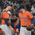 
              Houston Astros closing pitcher Ryan Pressly (55) greets catcher Martin Maldonado, left, after the Astros beat the Seattle Mariners 2-1 in a baseball game, Sunday, May 29, 2022, in Seattle. Pressly earned the save. (AP Photo/Ted S. Warren)
            