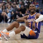 
              Phoenix Suns guard Chris Paul (3) argues a call during the first half of Game 3 of an NBA basketball second-round playoff series against the Dallas Mavericks, Friday, May 6, 2022, in Dallas. (AP Photo/Tony Gutierrez)
            